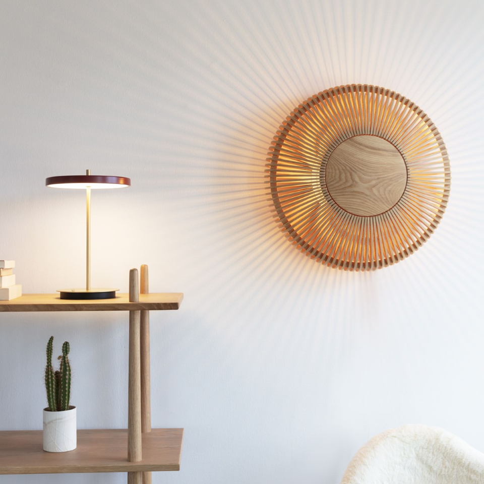 UMAGE Asteria Move LED Portable Table Lamp in Ruby Red — styled interior view 5
