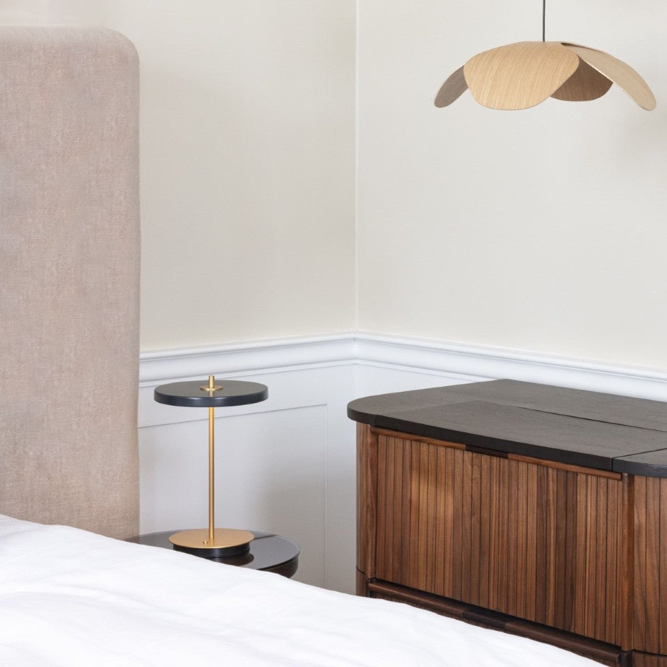 UMAGE Asteria Move LED Portable Table Lamp in Anthracite — styled interior view