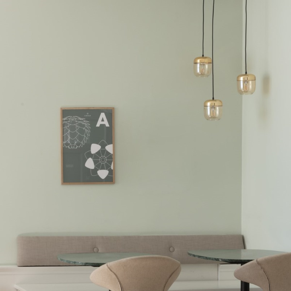 UMAGE Acorn Brass and Amber Glass Replacement Shade — styled interior view 3