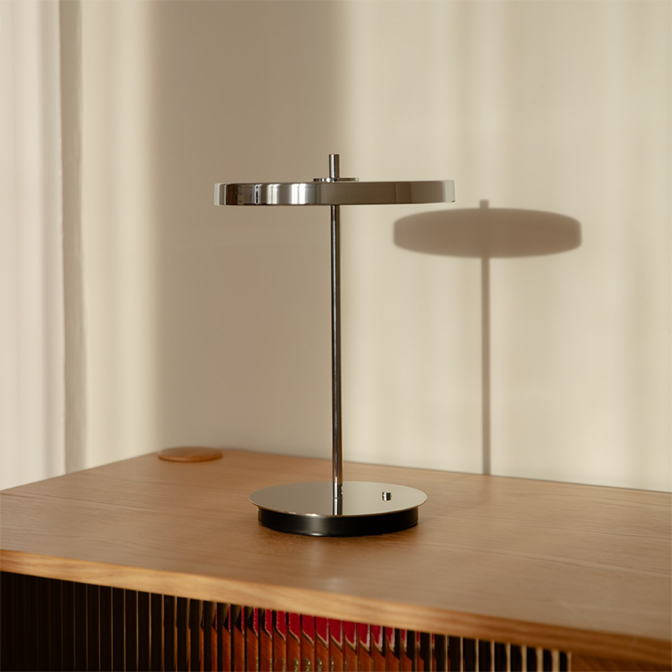 UMAGE Asteria Move Portable Table Lamp - Polished Steel / Polished Steel — styled interior view